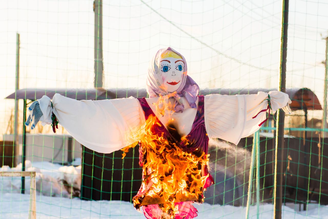 The effigy at the Shrovetide festival is burning.