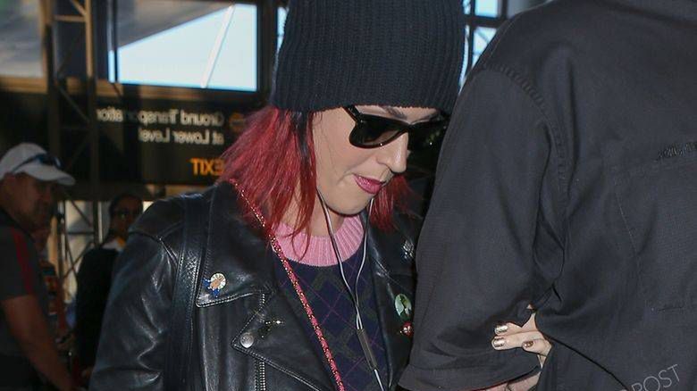 20 Oct 2014 - LOS ANGELES - USASINGER KATE PERRY LEAVING LOS ANGELES AT LAX AIRPORT ALL SHY AND SPORTING A BABY BUMP WHILE WALKING THRU THE TERMINAL HOLDING BODYGUARD ARMS.BYLINE MUST READ : XPOSUREPHOTOS.COM***UK CLIENTS - PICTURES CONTAINING CHILDREN PLEASE PIXELATE FACE PRIOR TO PUBLICATION *****UK CLIENTS MUST CALL PRIOR TO TV OR ONLINE USAGE PLEASE TELEPHONE  44 208 344 2007 ***