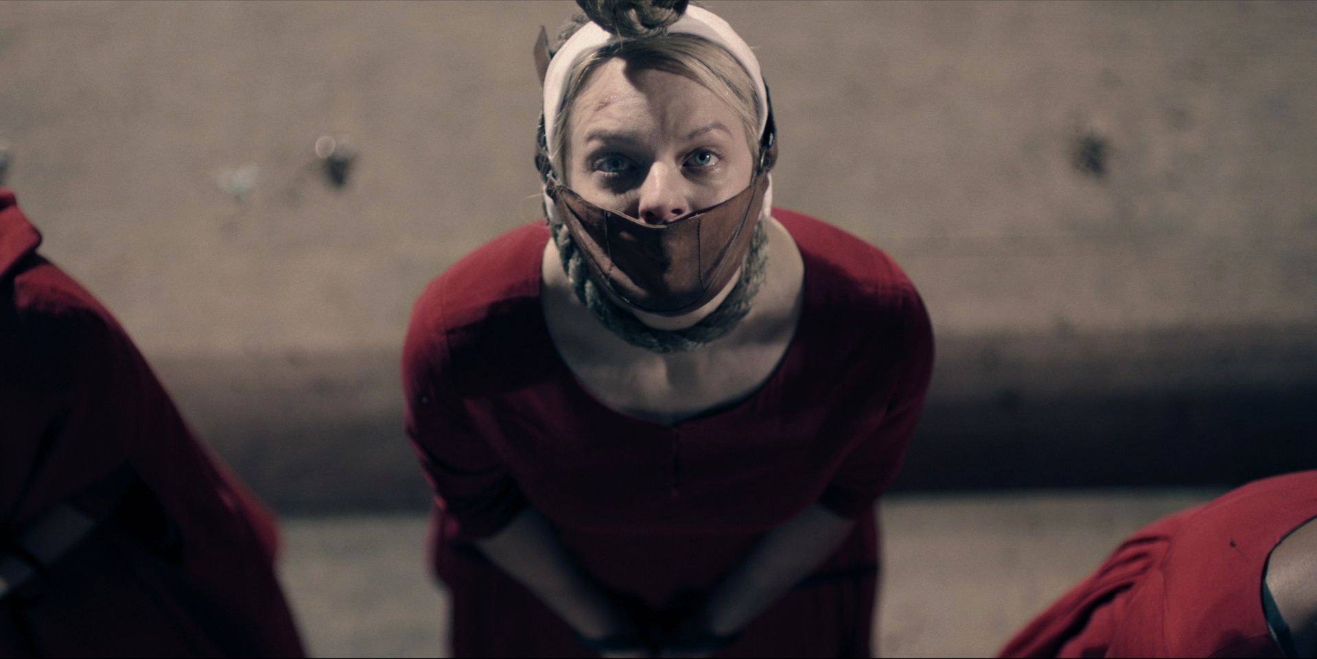 THE HANDMAID'S TALE -- "June" -- Episode 201 -- Offred reckons with the consequences of a dangerous decision while haunted by memories from her past and the violent beginnings of Gilead. Offred (Elisabeth Moss), shown. (Photo by: Take Five/Hulu) 