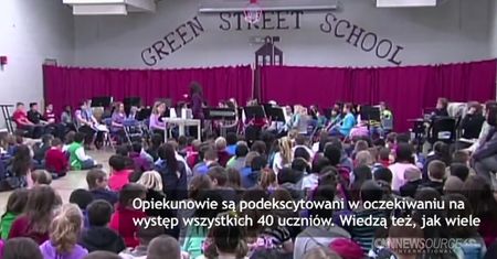 10-latek bez rąk gra na trąbce