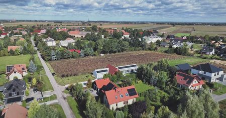 Dom na działce 21 m szerokości. Parterowy projekt 220 m²