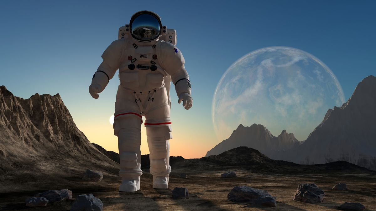 The astronaut  on the background of the planet.