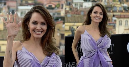 Promienna Angelina Jolie w przebraniu motyla pozuje na premierze "Czarownicy" (FOTO)