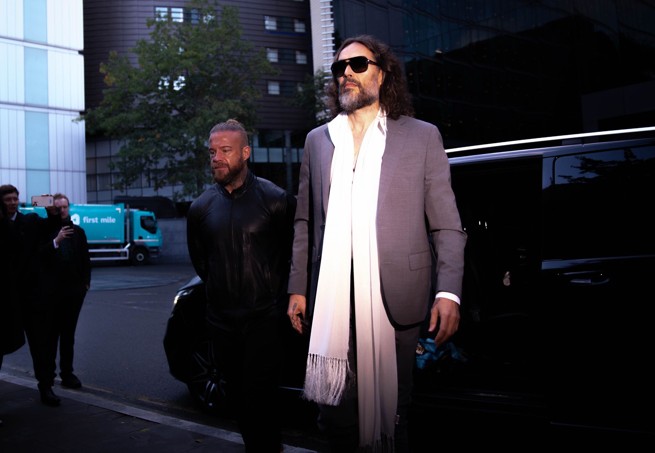 Russell Brand (right) arrives at Southwark Crown Court, London, where he faces three charges of rape, indecent assault, and three counts of sexual assault, relating to six women. Picture date: Thursday October 22, 2026. (Photo by James Manning/PA Images via Getty Images)