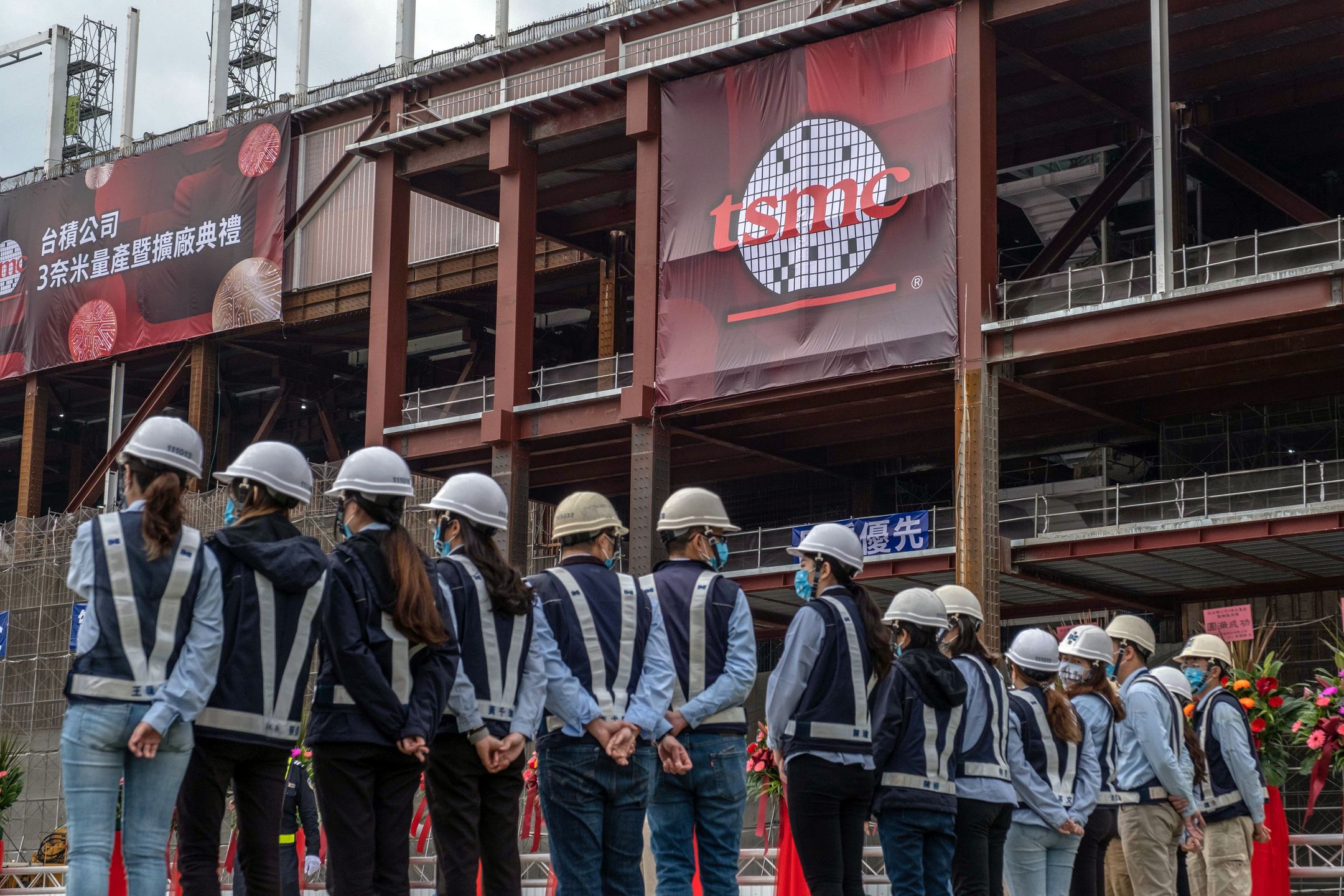TSMC Starts Next-Gen Mass ProductionWorkers gather for a ceremony that marks the beginning of bulk production of advanced 3-nanometer chips at a Taiwan Semiconductor Manufacturing Co. facility in Tainan, Taiwan, on Thursday, Dec. 29, 2022. TSMC kicked off mass production of next-generation chips Thursday, ensuring the island remains the linchpin of a critical technology fought over by governments from Washington to Beijing. Photographer: Lam Yik Fei/Bloomberg via Getty ImagesBloombergtaiwanese, tech, east asian, computing, information technology, business news, memory chips, industries, hardware, semiconductors