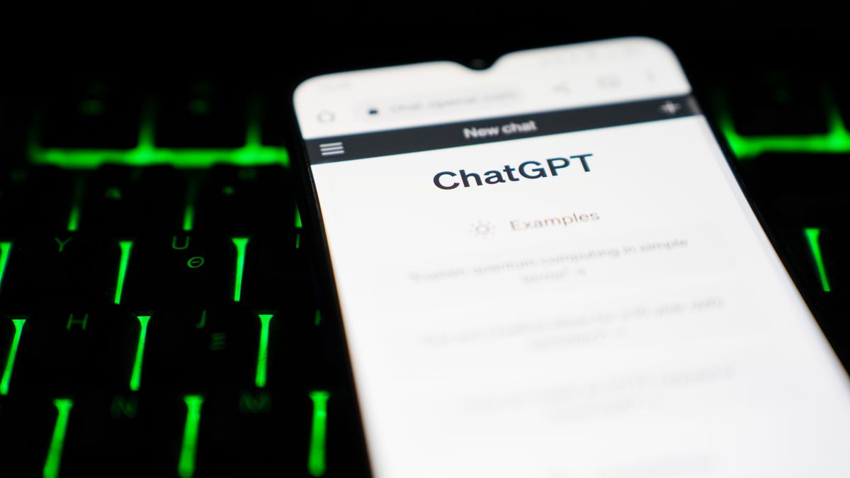 ChatGPT user interface is seen on a smartphone screen over a keyboard. (Photo by Nikos Pekiaridis/NurPhoto via Getty Images)