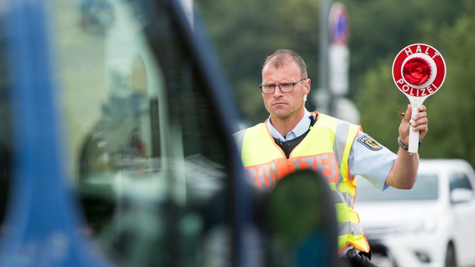 Police Patrols Border As Coalition Quarrels Over Migration PolicyKIEFERSFELDEN, GERMANY - JUNE 18: German federal police check cars arriving from Austria on a state road near the German-Austrian border on June 18, 2018 near Kiefersfelden, Germany. Two of the three parties in German's governing coalition, the German Christian Democrats (CDU) and the Bavarian Christian Democrats (CSU), have been quarrelling over migration policy. Horst Seehofer, who is Germany's minister of the interior and also heads the CSU, wants to turn away arriving migrants who will not qualify for asylum already at the border, whereas Chancellor and head of the CDU Angela Merkel wants a European-wide approach. (Photo by Lennart Preiss/Getty Images)Lennart PreissGovernment, Human Rights, Politics, Social Issues, FeedRouted_Germany