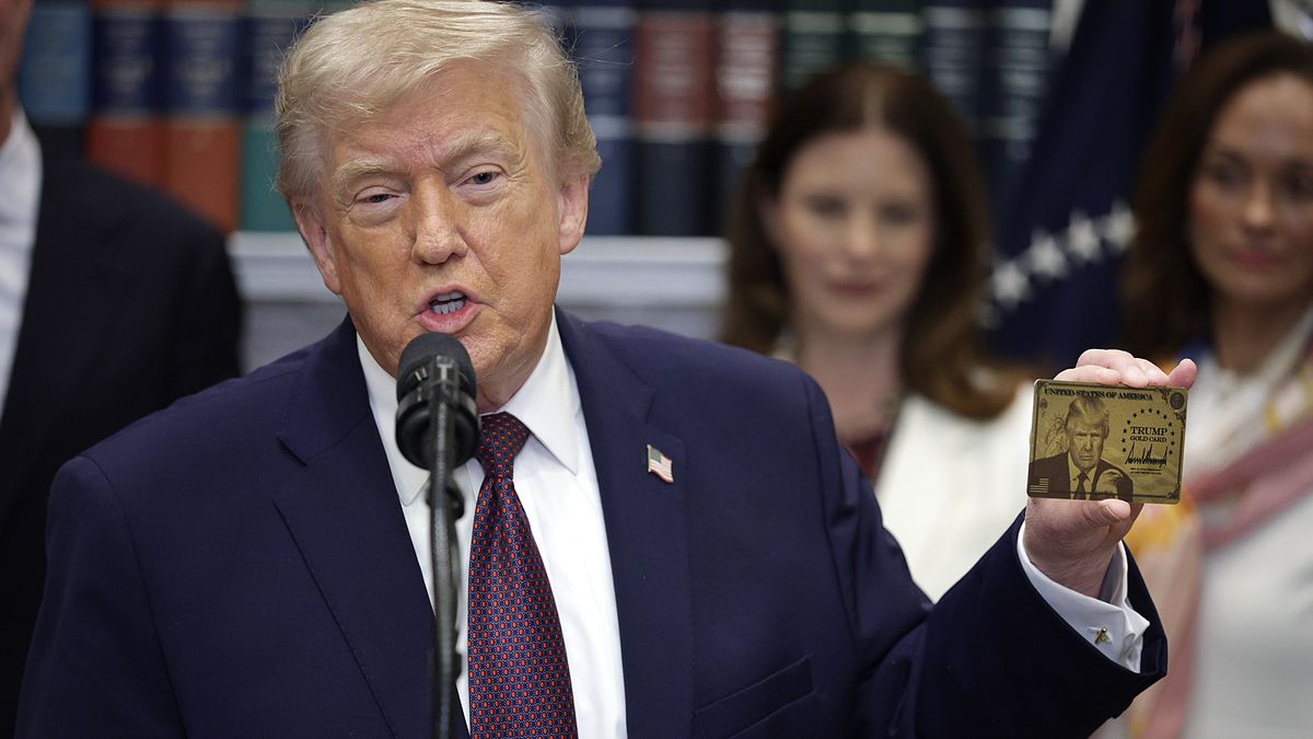 WASHINGTON, DC - DECEMBER 19: U.S. President Donald Trump holds a "Trump Gold Card" during an event in the Roosevelt Room of the White House December 19, 2025 in Washington, DC. Trump delivered remarks on lowering prescription drug prices during the event. (Photo by Alex Wong/Getty Images)