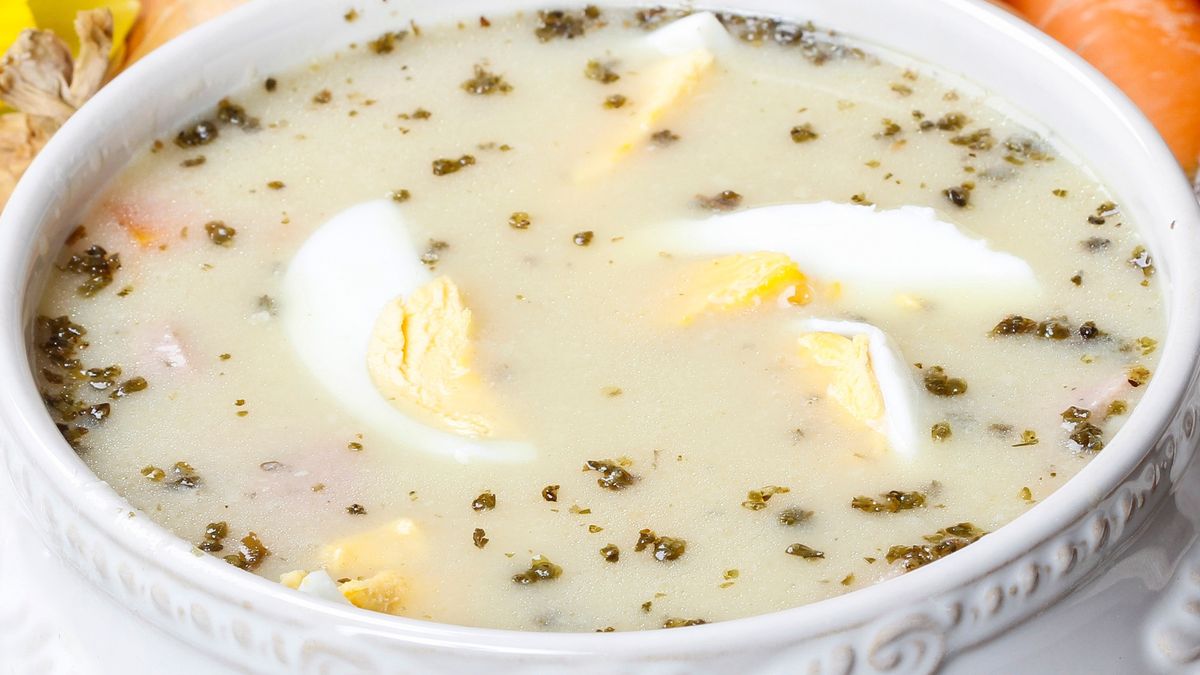 The sour rye soup made of soured rye flour and meat (usually boiled pork sausage or pieces of smoked sausage, bacon or ham)bacon, boiled, borscht, bouquet, bowl, carrot, cookbook, cooking, cuisine, czech, daffodils, delicacy, dinner, easter, egg, festive, flour, food, fresh, ham, homemade, hot, kitchen, kyselo, lunch, meal, meat, napkin, polish, porcelain, pork, potato, recipe, rye, sausage, serviette, serving, slovakia, smoked, soup, sour, spring, table, traditional, tureen, vase, white, wooden, zur, bacon, boiled, borscht, bouquet, bowl, carrot, cookbook, cooking, cuisine, czech, daffodils, delicacy, dinner, easter, egg, festive, flour, food, fresh, ham, homemade, hot, kitchen, kyselo, lunch, meal, meat, napkin, polish, porcelain, pork, potato, recipe, rye, sausage, serviette, serving, slovakia, smoked, soup, sour, spring, table, traditional, tureen, vase, white, wooden, zur