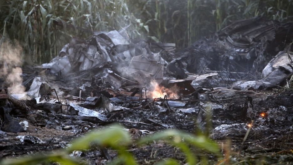 Temporary
A flame is seen amid debris of an Antonov cargo plane in Palaiochori village in northern Greece, Sunday, July 17, 2022, after it reportedly crashed Saturday near the city of Kavala. The An-12, a Soviet-built turboprop aircraft operated by the Ukrainian cargo carrier Meridian, crashed late Saturday as Greek Civil Aviation authorities said the flight was heading from Serbia to Jordan. (AP Photo/Giannis Papanikos), APTOPIX
AP