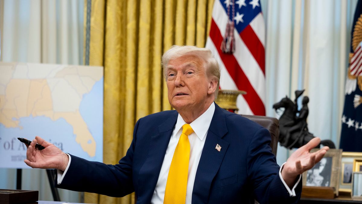 US President Donald Trump prepares to sign the commission during a swearing-in ceremony for Howard Lutnick, US commerce secretary, not pictured, in the Oval Office of the White House in Washington, DC, US, on Friday, Feb. 21, 2025. Lutnick, approved on a Senate vote of 51-45 on Tuesday, will oversee a large department with responsibilities ranging from fisheries management to export controls. Photographer: Francis Chung/Politico/Bloomberg via Getty Images
