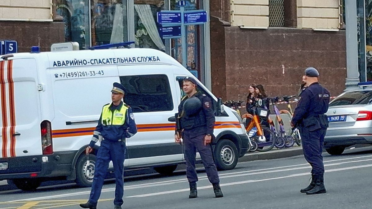 Temporary
Police guard an entrance of the Central Children's Store (Detsky Mir) after a blast that was reportedly caused by the explosion of a gas balloon, on the Lubyanka square near the headquarters of the Federal Security Service (FSB), the successor of KGB in Moscow, Russia, Sunday, Aug. 24, 2025. (Moscow News Agency via AP)