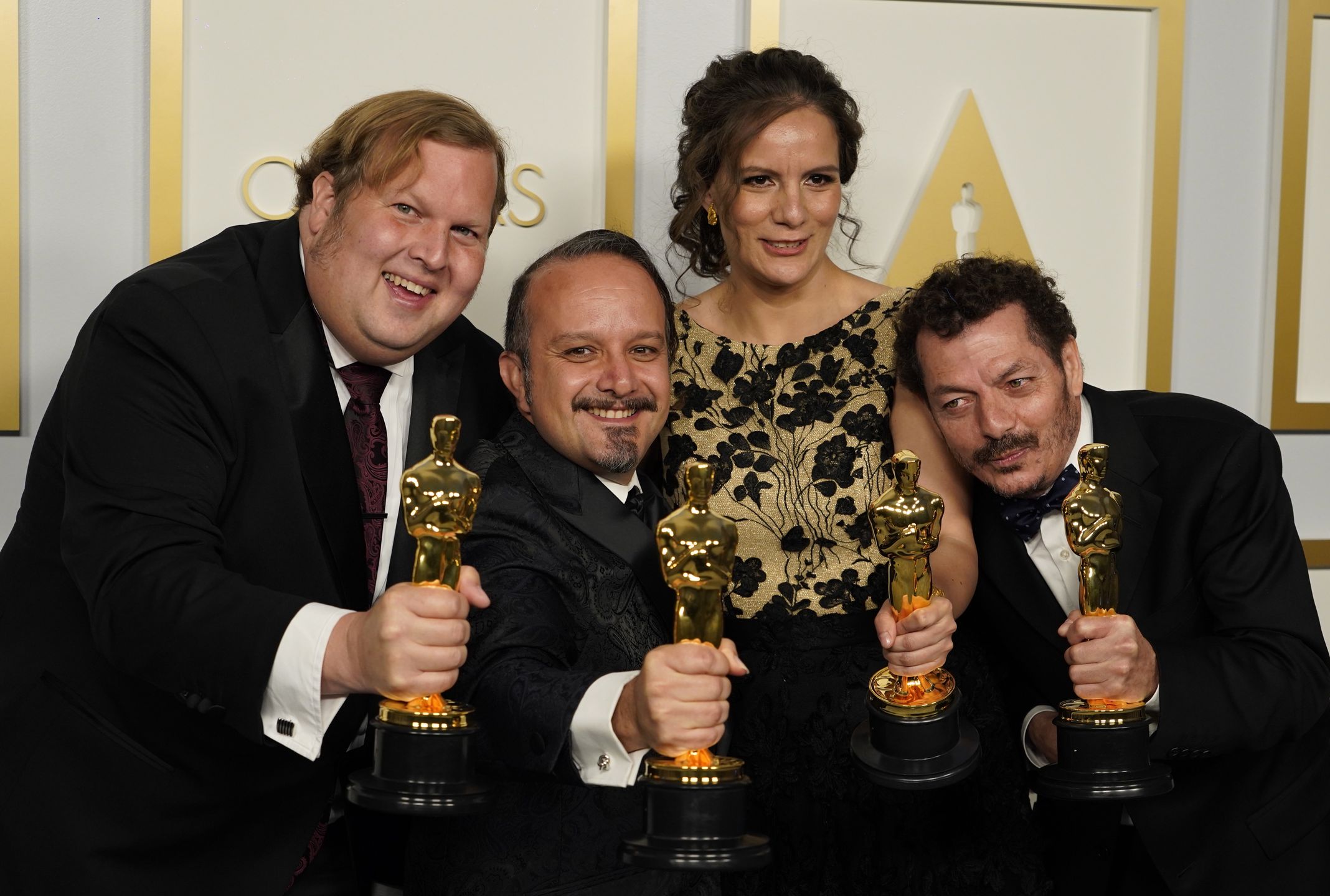 epa09160655 (L-R) Phillip Bladh, Carlos Cortes, Michellee Couttolenc and Jaime Baksht, winners of the award for best sound for 'Sound of Metal,' pose in the press room at the 93rd annual Academy Awards ceremony at Union Station in Los Angeles, California, USA, 25 April 2021. The Oscars are presented for outstanding individual or collective efforts in filmmaking in 24 categories. The Oscars happen two months later than originally planned, due to the impact of the coronavirus COVID-19 pandemic on cinema.  EPA/Chris Pizzello / POOL *** Local Caption *** 55864152 Dostawca: PAP/EPA.