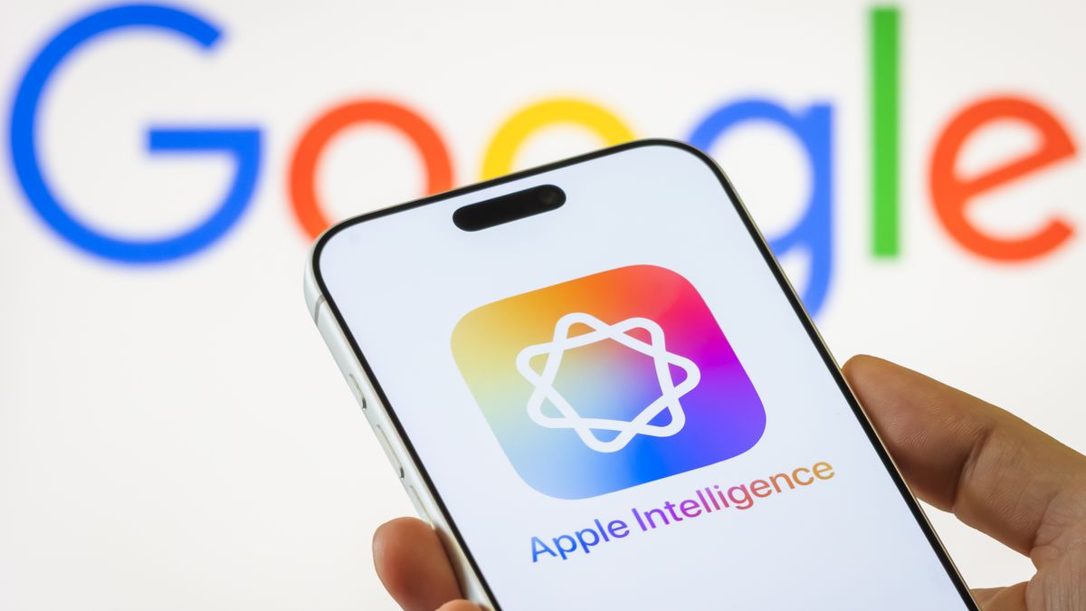 CHONGQING, CHINA - JANUARY 13: In this photo illustration, an Apple iPhone displays the Apple Intelligence logo on its screen against a blurred Google logo background on January 13, 2026, in Chongqing, China. Apple and Google have announced a multi-year strategic partnership under which Apple will integrate Google's advanced Gemini AI models to enhance its Apple Intelligence features, including a major overhaul of the Siri voice assistant. The deal marks a rare collaboration between two longtime rivals in artificial intelligence and mobile technology. (Photo illustration by Cheng Xin/Getty Images)