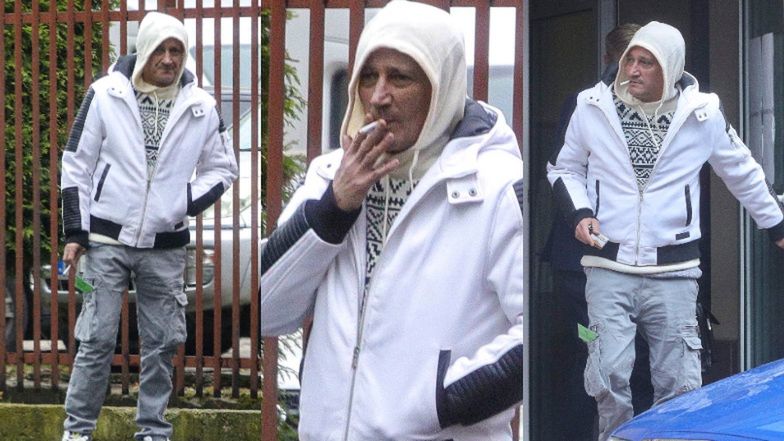 Skwaszony Michał Wiśniewski na fajce pod prokuraturą