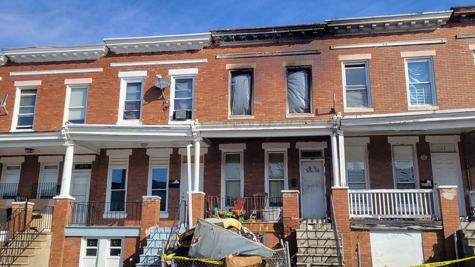 An early morning house fire on Brighton Street critically injured five on Saturday, March 18, 2023, in Baltimore. Three of the victims were children; all three died shortly after being rescued. (Dillon Mullan/Baltimore Sun/Tribune News Service via Getty Images)