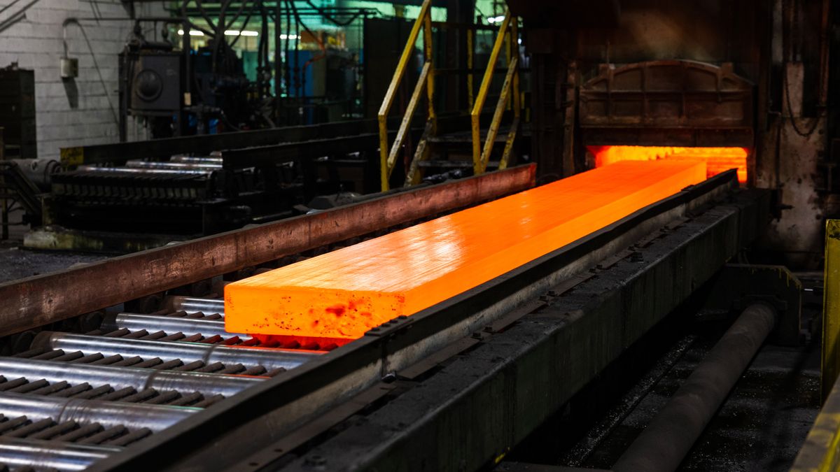 A copper cake goes through a furnace in the rolling mill at Revere Copper Products in Rome, New York, US, on Wednesday, Aug. 6, 2025. US President Donald Trump went ahead with 50% tariffs on copper imports but exempted refined metals, which are the mainstay of international trading. Photographer: Lauren Petracca/Bloomberg via Getty Images