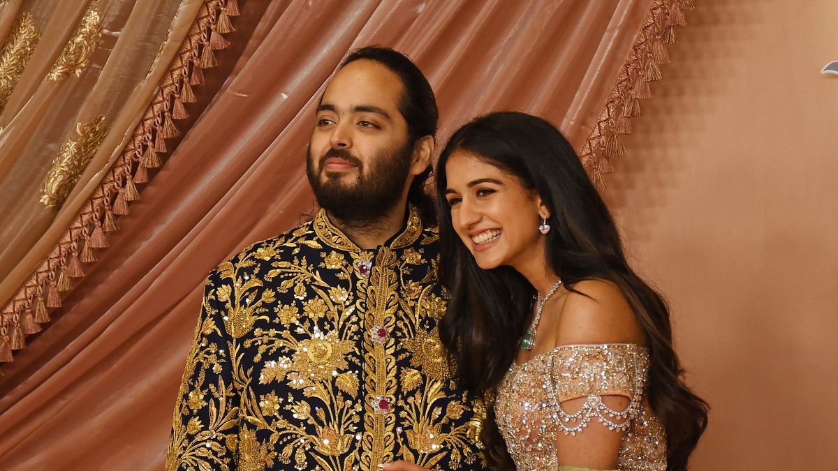 Anant Ambani (son of Indian businessman Mukesh Ambani) and
MUMBAI, MAHARASHTRA, INDIA - 2024/07/05: Anant Ambani (son of Indian businessman Mukesh Ambani) and his fiancée Radhika Merchant pose for a photo on the red carpet during the sangeet ceremony at Jio World Centre in Mumbai. (Photo by Ashish Vaishnav/SOPA Images/LightRocket via Getty Images)
SOPA Images
traditional, jio world centre, son of indian businessman, sangeet ceremony, personality, fiancée, celebrity, red carpet, famous