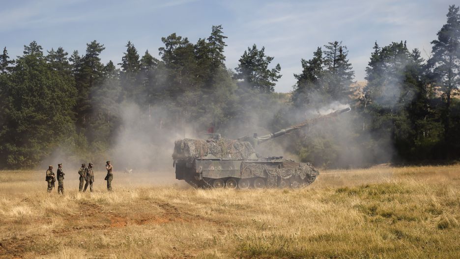 A German Army PZH 2000 tank howitzer fires ammunition during the US-led NATO and partner Dynamic Front 22 multinational live-fire training exercise at the Grafenwoehr Training Area in Grafenwoehr, Germany, on Wednesday, July 20, 2022. The Dynamic Front 22 exercise with participants from 19 nations seeks to build interoperability across the human, procedural and technical domains. Photographer: Alex Kraus/Bloomberg via Getty Images