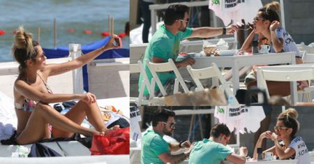 Mąż karmi znudzoną Siwiec na plaży w Sopocie... (ZDJĘCIA)