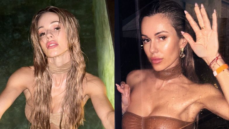 Doda w przezroczystym kostiumie wyłania się z wody 