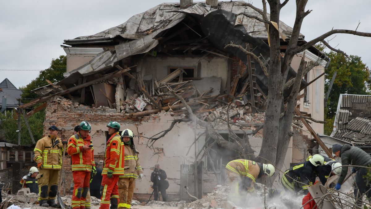 LVIV, UKRAINE - OCTOBER 5: Emergency service members are working to remove the debris of the private houses hit by a Russian missiles using heavy equipment after the Russian attack on Lviv, Ukraine on October 5, 2025. On the night of October 5, Russia carried out a combined shelling of Lviv with missiles and drones. Many private homes, cars and industrial facilities were damaged in the attack, which was one of the largest attacks on the city. Four people died in the attack and two of the injured were reported to be in serious condition. (Photo by Olena Znak/Anadolu via Getty Images)