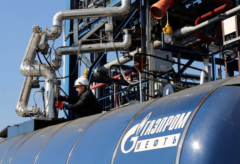 Production Facilities At OAO Gazprom Neft's Refinery
A Gazprom employee is seen filling a fuel tanker at the OAO Gazprom Neft oil refinery in Moscow, Russia, on Thursday, Sept. 20, 2012. OAO Gazprom Neft, the oil arm of Russia's state-run natural-gas producer, started operating a 3.2 billion-ruble ($100 million) bitumen processor at its Moscow refinery this month as it seeks to reduce pollution. Photographer: Andrey Rudakov/Bloomberg via Getty Images
Bloomberg
BUSINESS; CORPORATION; CORPORAT, CRUDE OIL; OIL; ENERGY; FUEL, EAME; EUROPE; RUSSIA; USSR, EMEA; EUROPE, FINANCE; FINANCIAL; ECONOMY, OIL TANKER; TANKER; SHIP, OIL; FUEL; GAS; PETROL; PETROLE, PICKUP TRUCK; TRUCK; VEHICLE