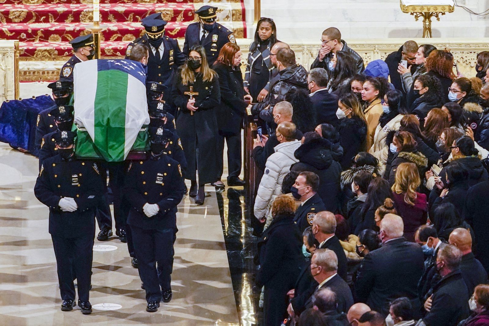 NYPD officer funeral
MARY ALTAFFER / POOL