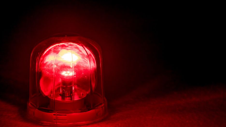 Emergency rotating alarm red light at night.emergency, alarm, light, red, security, police, rescue, fire, danger, beacon, ambulance, bulb, background, warning, flash, rotary, equipment, urgency, alert, siren, closeup, glowing, lamp, safety, attention, flasher, sign, rotating, night, flashing, urgent, caution, accident, warn