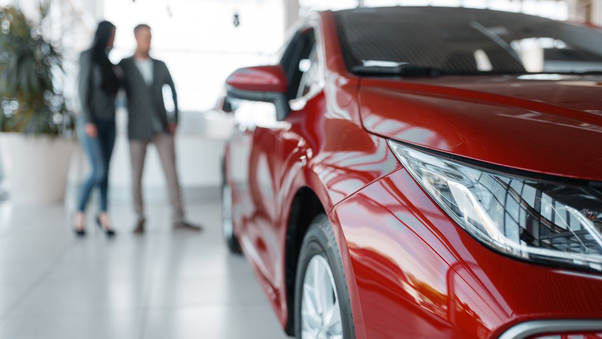 Couple buying new red car in showroomCouple buying new red car in showroom. Male and female customers looks vehicle in dealership, automobile sale, auto purchasesale, vehicle, new, car, customer, dealership, woman, showroom, people, automobile, business, transportation, smiling, transport, happy, retail, rental, auto, beautiful, buying, dealer, caucasian, buy, indoors, man, key, female, person, shop, purchase, service, buyer, driver, industry, couple, salesman, owner, male, cheerful, selling, rent, agreement, choosing, manager, insurance, girl, salon, happiness