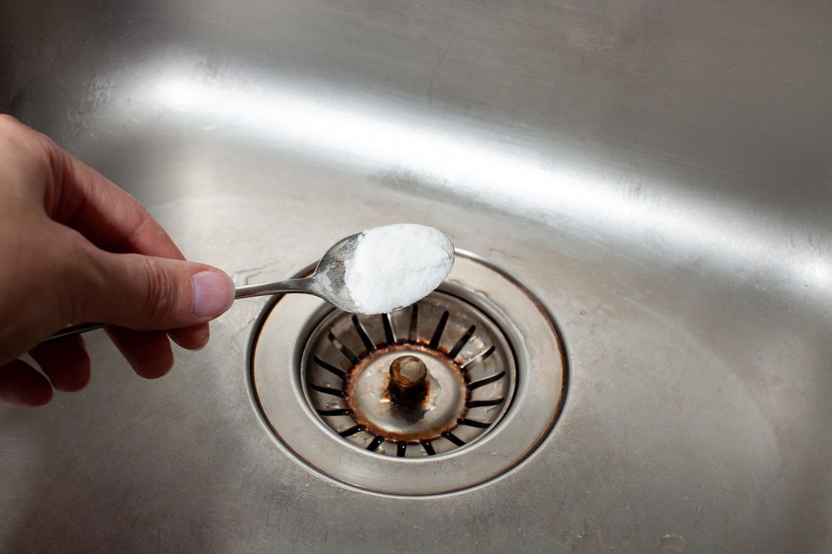 My mom unclogs the sink in two minutes. Instead of store-bought chemicals, she pours 2 tablespoons down the drain.