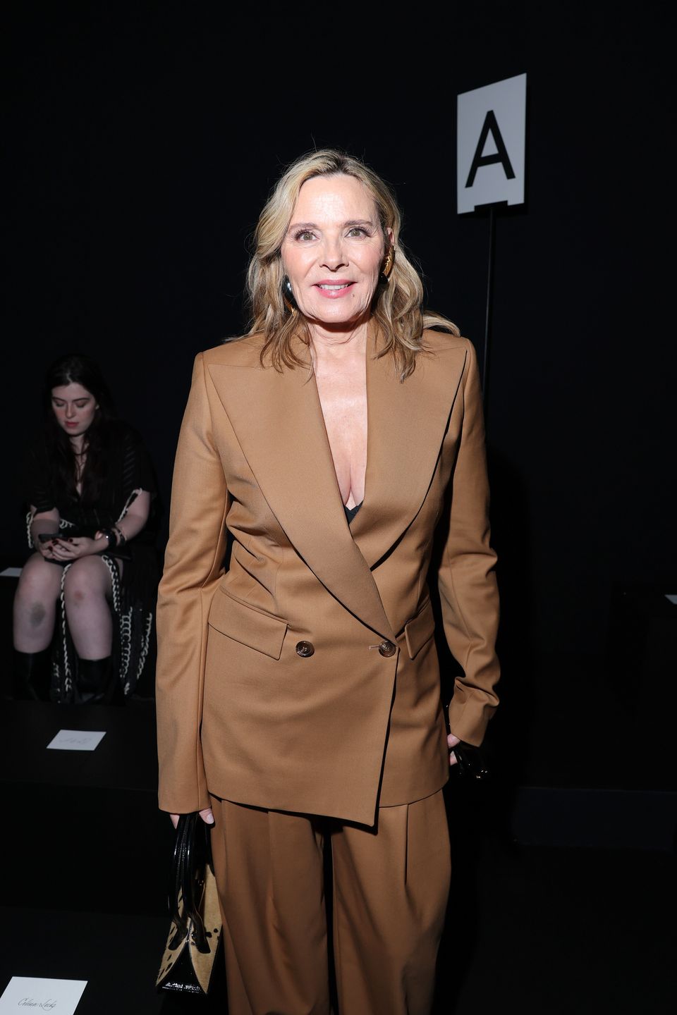 PARIS, FRANCE - MARCH 07: (EDITORIAL USE ONLY - For Non-Editorial use please seek approval from Fashion House) Kim Cattrall  attends the Nina Ricci Womenswear Fall/Winter 2025-2026 show as part of Paris Fashion Week  at Hotel Salomon de Rothschild on March 07, 2025 in Paris, France. (Photo by Jacopo Raule/Getty Images)