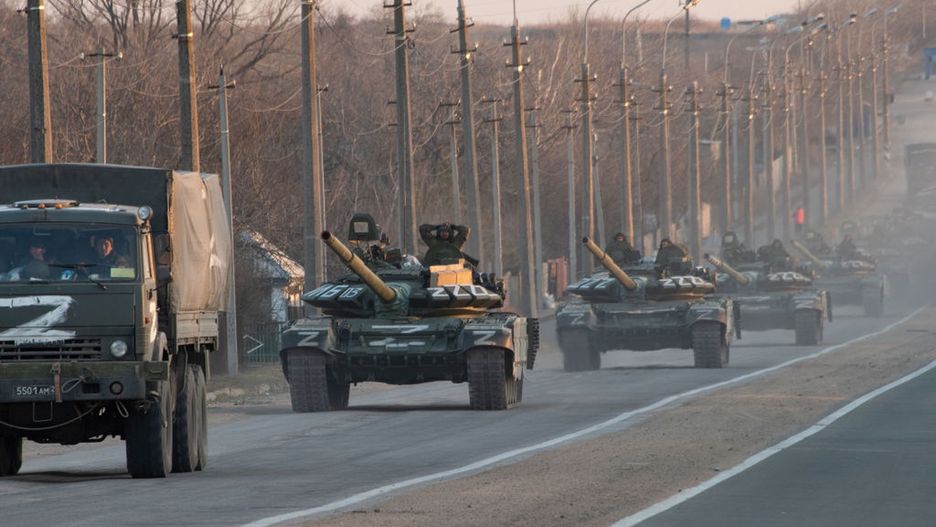 A column of tanks marked with the Z symbol stretches intoMARIUPOL, UKRAINE - 2022/03/23: A column of tanks marked with the Z symbol stretches into the distance as they proceed northwards along the Mariupol-Donetsk highway. The battle between Russian / Pro Russian forces and the defencing Ukrainian forces lead by Azov battalion continues in the port city of Mariupol. (Photo by Maximilian Clarke/SOPA Images/LightRocket via Getty Images)SOPA Imagestank, z symbol, z