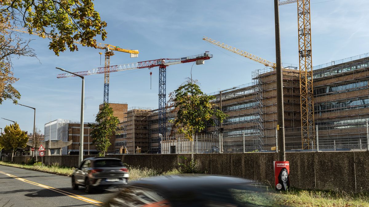 Tower cranes at the Quelle building, a monumental 1950s symbol of Germany's postwar economic revival, under redevelopment in Nuremberg, Germany, on Monday, Oct. 2, 2023. The project's developer Gerch Group, which has 4 billion ($4.2 billion) of projects under construction, has filed for insolvency proceedings in yet another blow to a property market that's reeling from the end of the cheap-money era. Photographer: Ben Kilb/Bloomberg via Getty Images