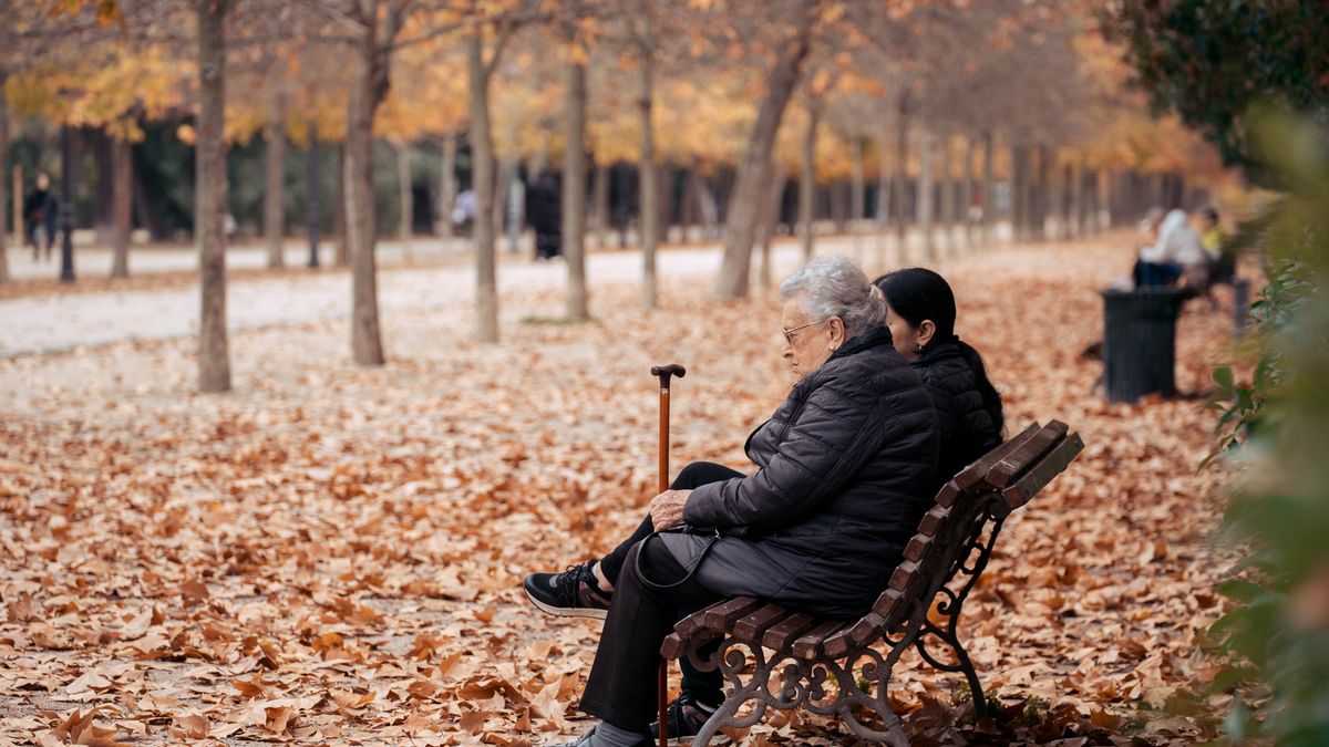MADRID, SPAIN - NOVEMBER 29: An elderly woman sits on a bench on November 29, 2023, in Madrid, Spain. Contributory pensions will rise by 3.8% in 2024 with the revaluation formula included in the pension reform law, which takes into account, as a reference to determine the rise in these benefits, the 12-month average year-on-year CPI. The National Statistics Institute (INE) has published the advance CPI data for November, making it possible to anticipate how much contributory pensions will be revalued in 2024 by taking the average of the previous twelve months. The calculation obtained is 3.76%, a percentage that will be rounded up to 3.8%, so that contributory pensions will rise next year by that amount. (Photo By Gabriel Luengas/Europa Press via Getty Images)