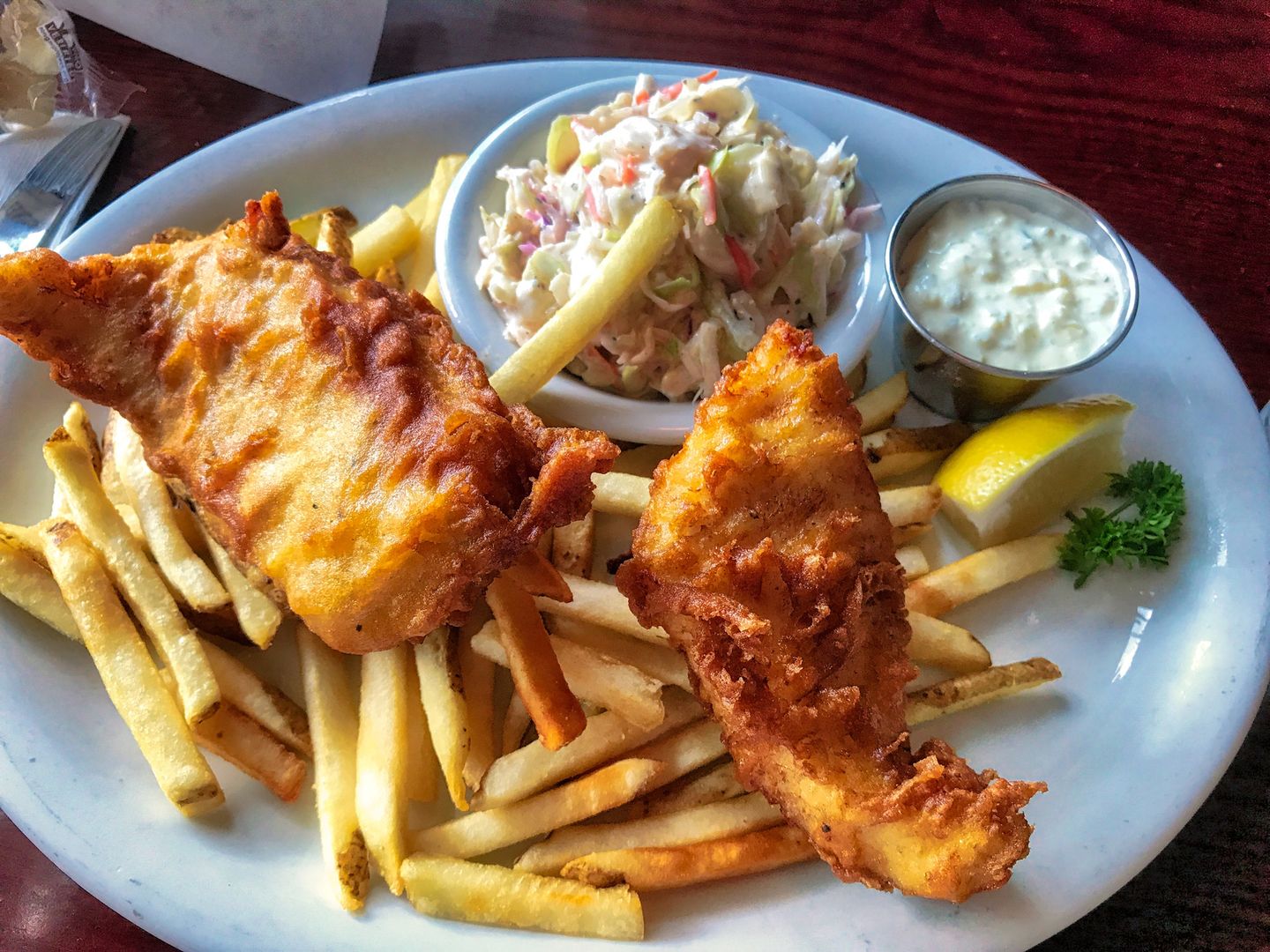 A plate of Fish and Chips woth coleslaw
A plate of Fish and Chips woth coleslaw - image
Riderolga