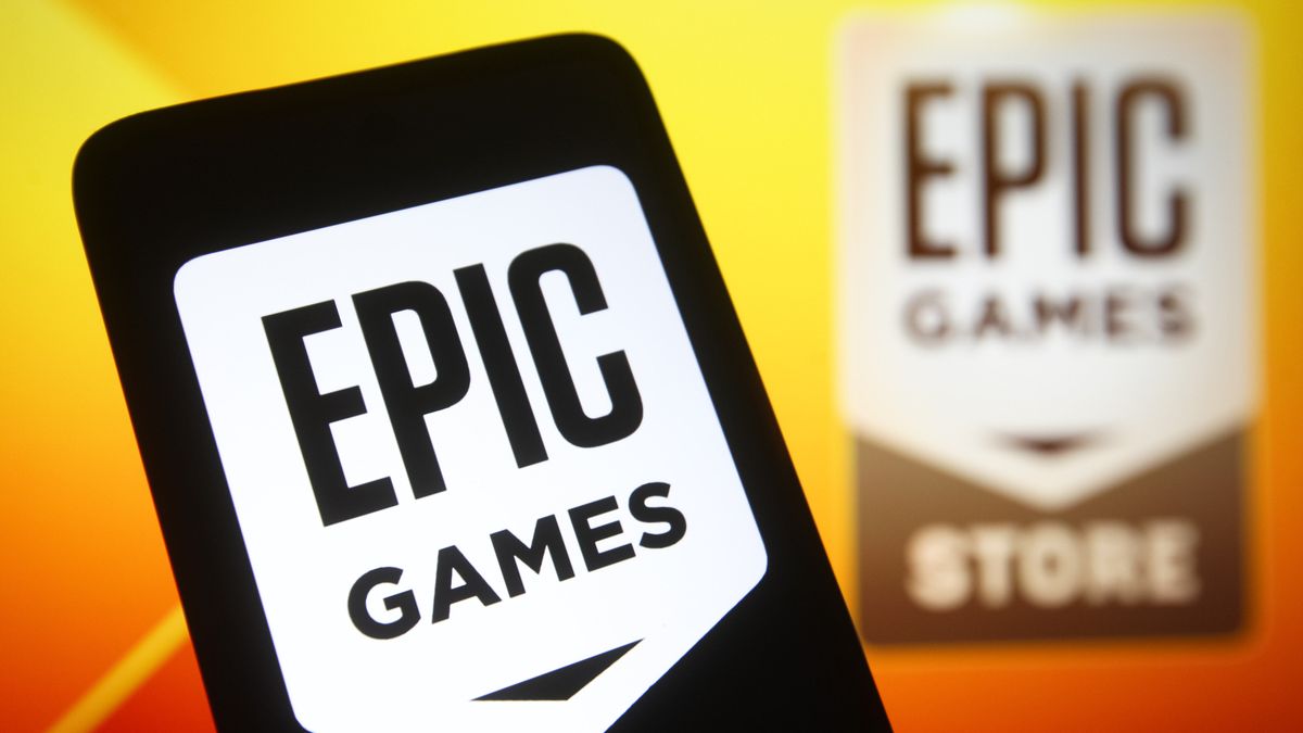 KIEV, UKRAINE - 2021/12/27: In this photo illustration, Epic Games logo of a video game and software developer is seen on a smartphone screen and in the background. (Photo Illustration by Pavlo Gonchar/SOPA Images/LightRocket via Getty Images)