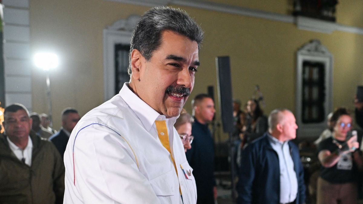 Temporary
Venezuela's President Nicolas Maduro gestures as he arrives for the projection of a biographical series at the National Theatre of Venezuela in Caracas on November 22, 2025. (Photo by Juan BARRETO / AFP)
JUAN BARRETO