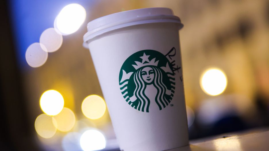 Starbucks paper cup is seen on a street in Florence, Italy on March 12th, 2025 (Photo by Beata Zawrzel/NurPhoto via Getty Images)
