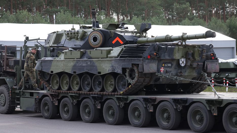 KLIETZ, GERMANY - FEBRUARY 23: A Leopard 1A5 main battle tank arrives on a flatbed truck during a demonstration of capabilities at a military training center where Ukrainian crews are receiving training on February 23, 2024 near Klietz, Germany. The Bundeswehr, Germany's armed forces, is training Ukrainians on the Leopard 1A5 main battle tank and the Marder infantry fighting vehicle as part of an ongoing program to supply Ukraine with weaponry. Tomorrow will mark the 2nd anniversary of Russia's invasion of Ukraine as Russian forces appear to be gaining momentum against munitions-starved Ukrainian defenders. (Photo by Sean Gallup/Getty Images)