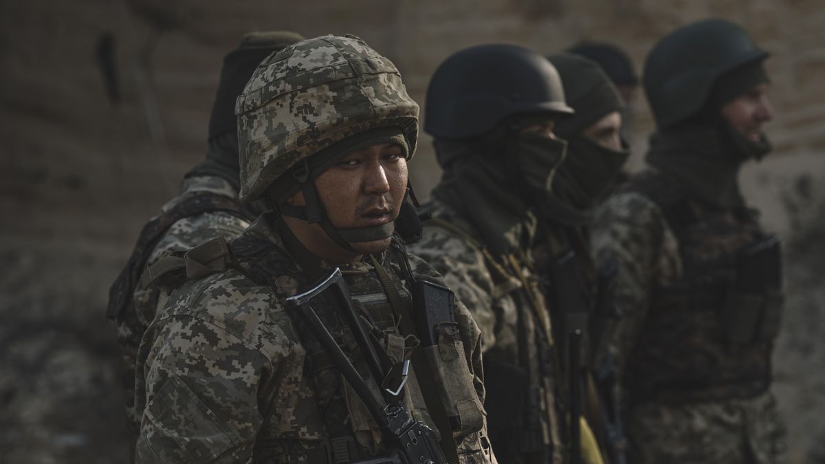 A member of the Siberian Battalion from Buryatia, with the call sign 'Buryat', participates in military exercises with the International Legion of the Armed Forces of Ukraine at an undisclosed location in Ukraine, on Tuesday, Oct. 24, 2023. Ukraine's president held talks with the European Commission ahead of its expected decision next month to recommend opening accession talks with Kyiv. Photographer: Andrew Kravchenko/Bloomberg via Getty Images