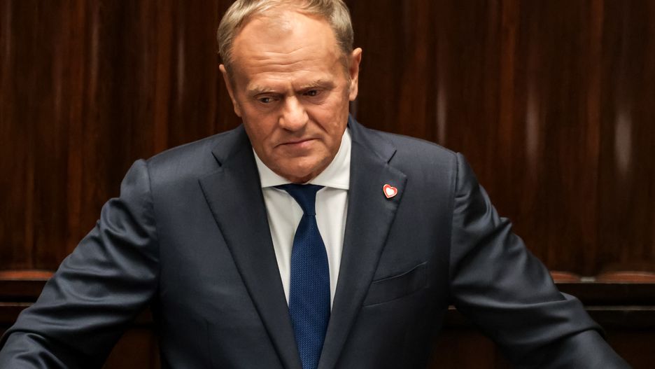 Prime Minister of Poland Donald Tusk speaks to MPs  during the plenary proceedings of vote of confidence for Polish government in Polish Parliament building after the coalition which holds power lost presidential election  at the beginning of June - Warsaw, capital of Poland on June 11, 2025. The government was granted the constitutional confidence and can continue the work. (Photo by Dominika Zarzycka/NurPhoto via Getty Images)