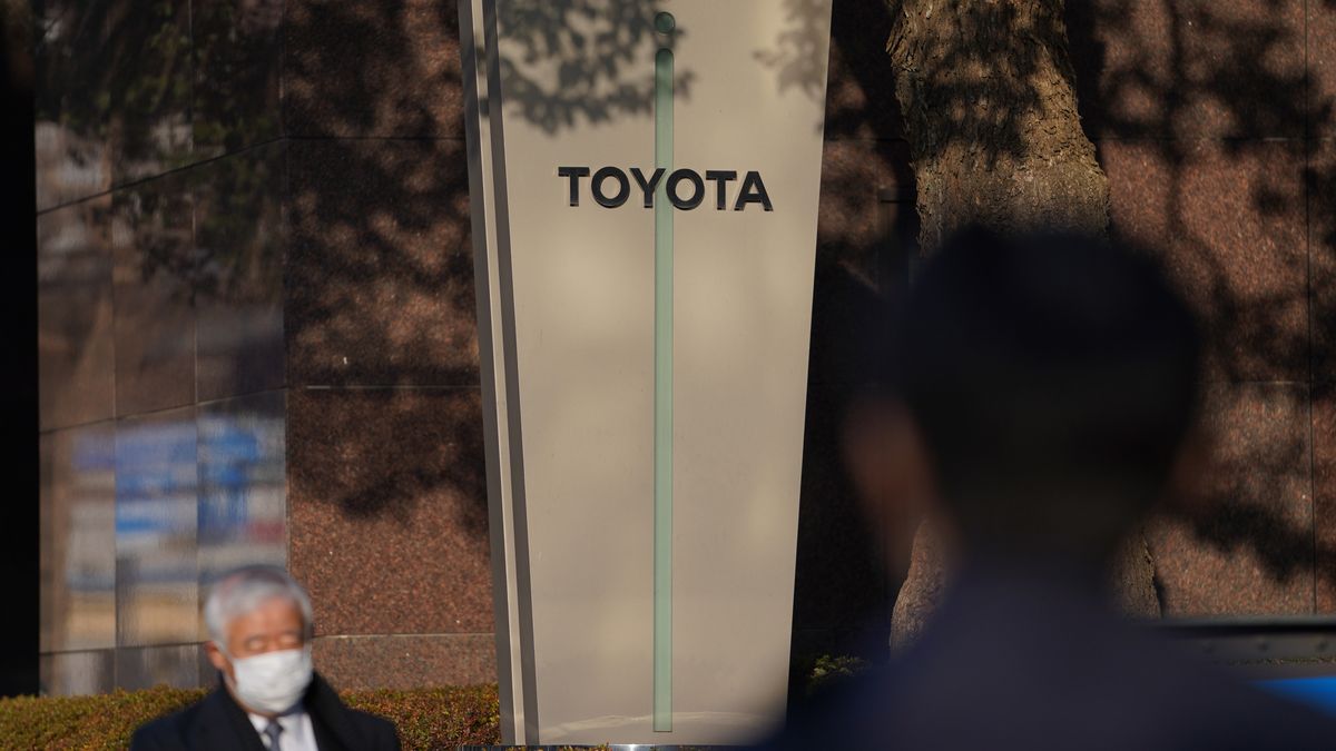 Signage for Toyota Motor Corp. displayed outside the company's head office in Tokyo, Japan, on Tuesday, March 1, 2022. Toyota will suspend work at all of its Japanese factories Tuesday after a supplier shut down its computer systems over concern about a possible cyberattack. Photographer: Toru Hanai/Bloomberg via Getty Images
