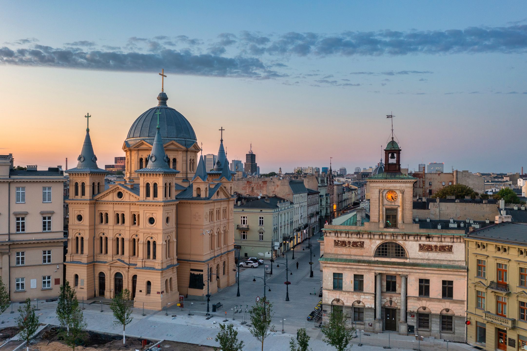 Beautiful scenery of Lodz city center with Piotrkowska street at dawn, Poland
lodz, city, landmark, aerial, cityscape, view, travel, urban, architecture, street, skyline, tourism, drone, town, old, building, poland, landscape, piotrkowska, house, europe, sky, polish, sunset, church, horizon, historic, place, freedom, central, summer, scenery, cupola, dome, sunrise, dawn, square, dusk, center, roof, light, downtown, european, district, street light, from above, illuminated