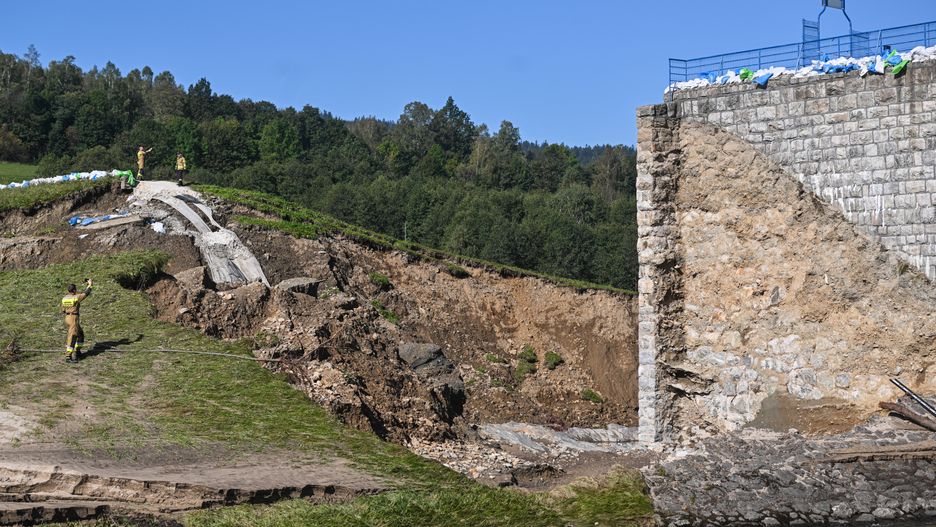 STRONIE SLASKIE, POLAND - SEPTEMBER 21 : Firefighters inspect the broken Morawka river dam days after an intensive flood on September 21, 2024 in Stronie Slaskie, Poland. Poland and neighboring countries experienced widespread flooding after heavy rains swept the region during Storm Boris.  (Photo by Omar Marques/Getty Images)