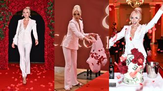 Caroline Derpienski bryluje na AUTORSKIM pokazie mody. Biały garnitur, klapki za 4 tysiące, płatki róż i "dolarsowy" tort... (ZDJĘCIA)