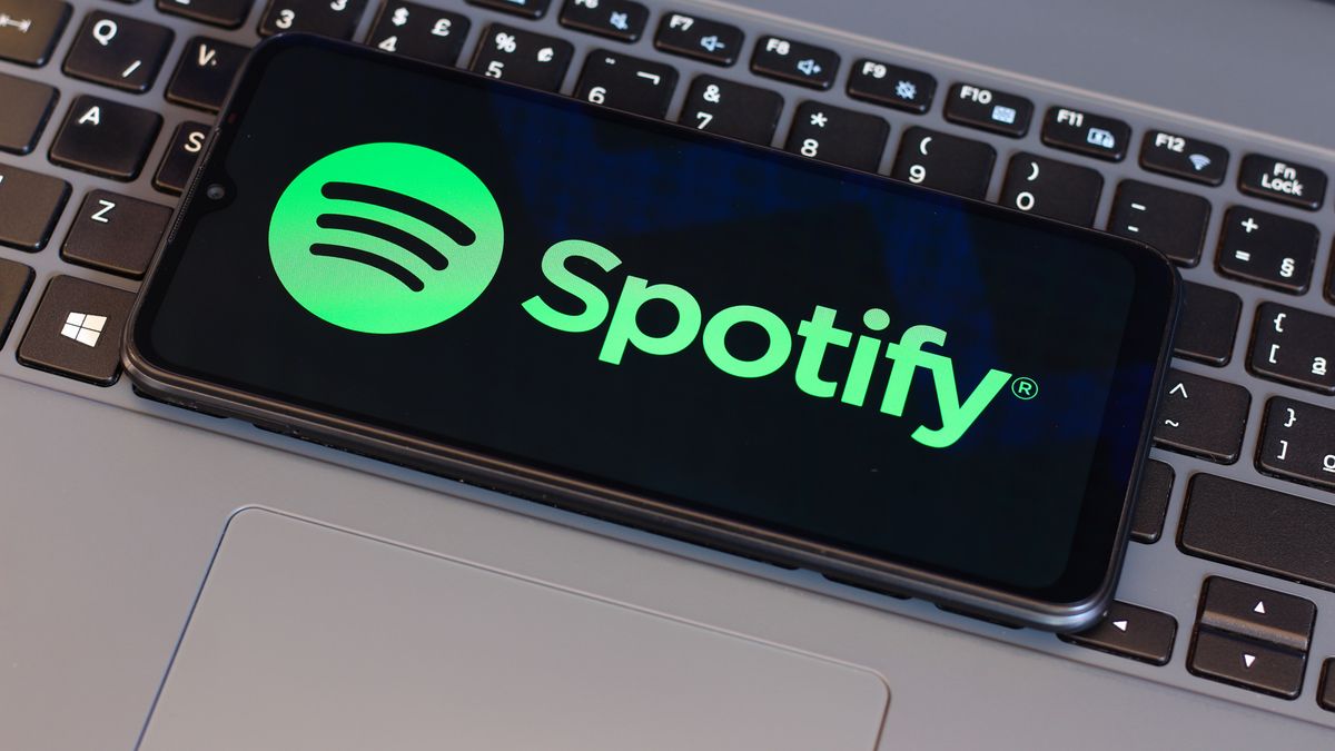 In this photo illustration, the Spotify logo is seen
CANADA - 2025/01/11: In this photo illustration, the Spotify logo is seen displayed on a smartphone screen next to a laptop keyboard. (Photo Illustration by Thomas Fuller/SOPA Images/LightRocket via Getty Images)
SOPA Images
smartphone, device, laptop keyboard, online, cellphone, brand, logos, phone
