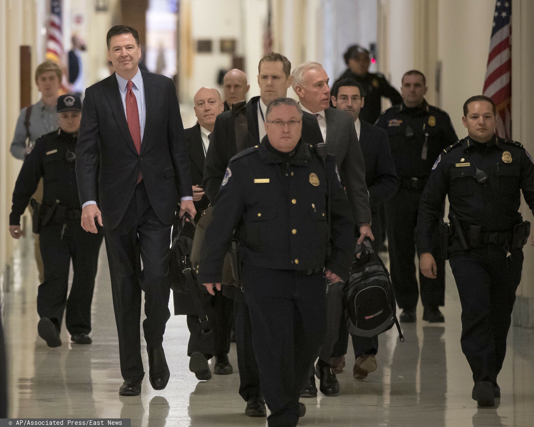 arch33
Former FBI Director James Comey arrives on Capitol Hill in Washington, Monday, Dec. 17, 2018, to testify under subpoena in a second closed-door interview with the GOP-led House Judiciary and Oversight Committees in their probe of conduct by federal law enforcement officials in the investigation of President Donald Trump's alleged Russia ties, and Hillary Clinton's emails,  (AP Photo/J. Scott Applewhite), APTOPIX
AP