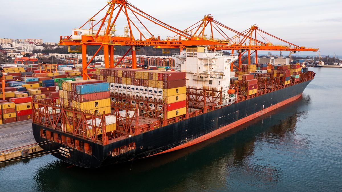 EDITORS NOTE: Image taken with a drone)
Navarino Hong Kong
GDYNIA, POMERANIA, POLAND - 2017/09/14: EDITORS NOTE: Image taken with a drone)
Navarino Hong Kong container ship seen at the Baltic Container Terminal in Gdynia. (Photo by Mateusz Slodkowski/SOPA Images/LightRocket via Getty Images)
SOPA Images
shipping container, shipping containers, stored, containers, baltic container terminal, navarino hong kong
