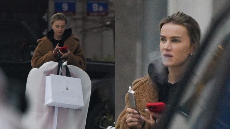 Maffashion zaspokaja głód nikotynowy przed butikiem Macieja Zienia